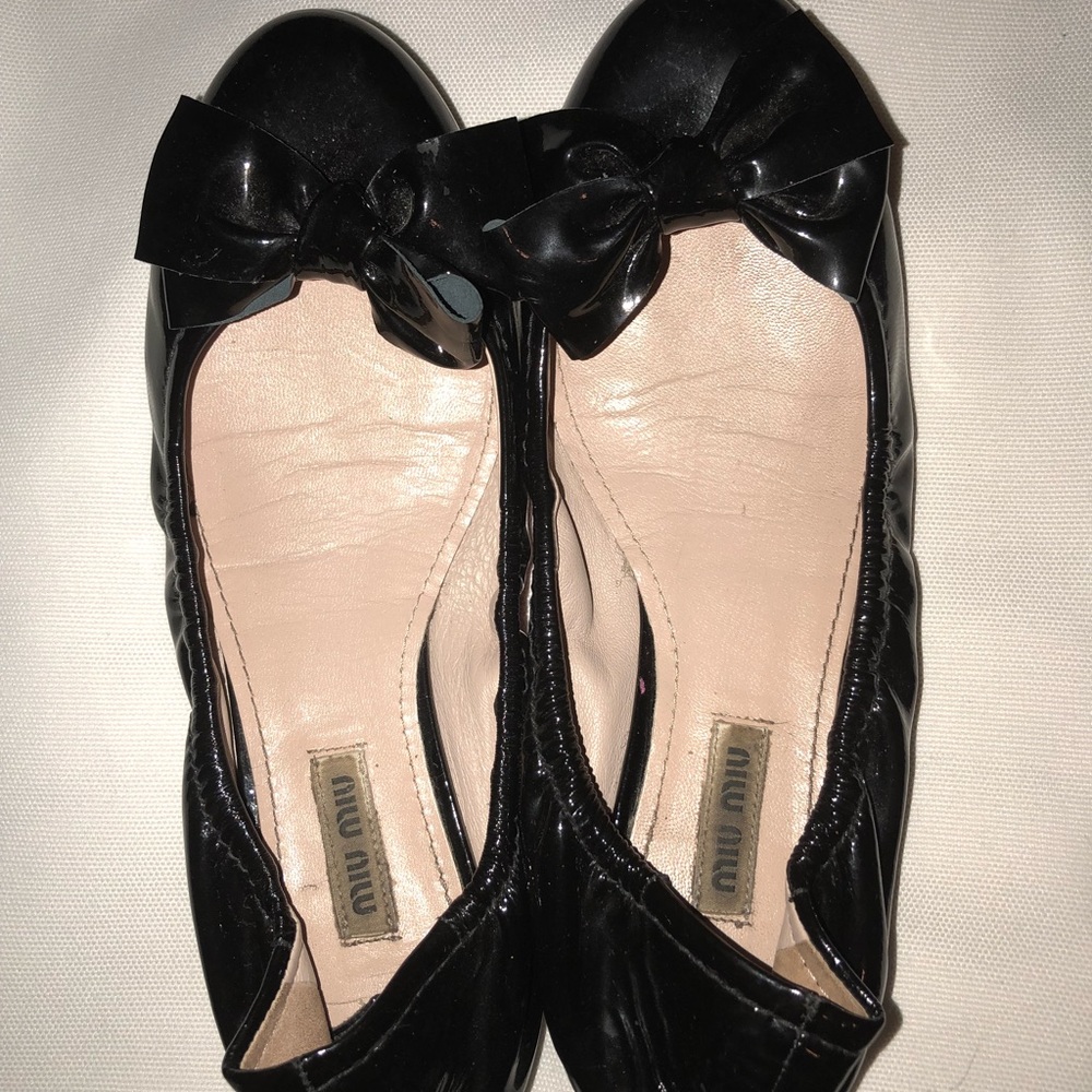 Miu Miu black flats with diamond stones on bottom